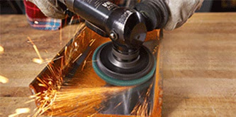 cleaning metal with 3M Scotch-Brite Clean and Strip XT Disc
