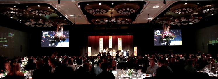 Wide shot of the awarding event