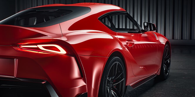 Red car protection wrap film on sports car
