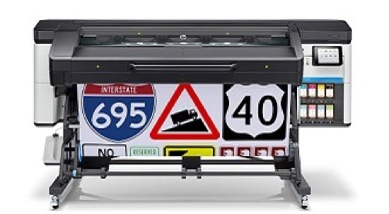 A large, HP Latex 700 digital sign printer, printing  street signs.