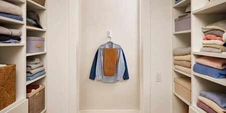 Install Command folding clothes hanger in the closet
