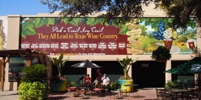 The side of a large building with a wine country graphic informational sign made with 3M graphics and signage products.
