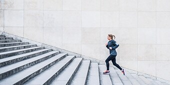 women running up stairs
