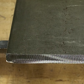 Metal edge that needs beveling