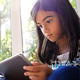 Student Reading iPad