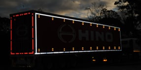 Marker lights and reflective tapes when combined and applied on a truck