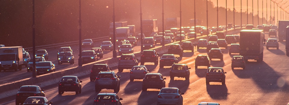 Heavy traffic on highway filled with cars